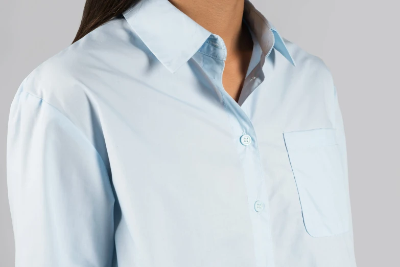 woman in blue blouse, close up view