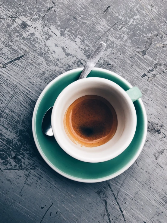 an espresso coffee in a cup on a saucer