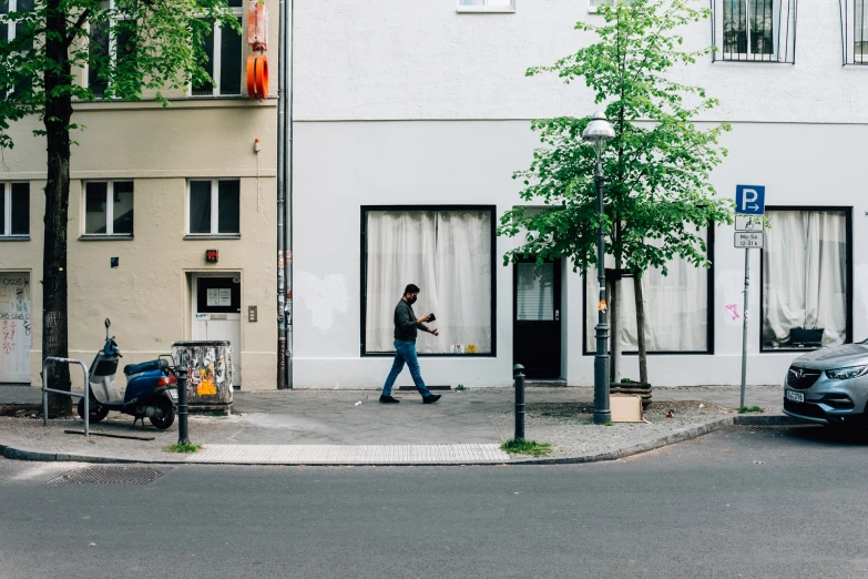 a person walking in front of a house