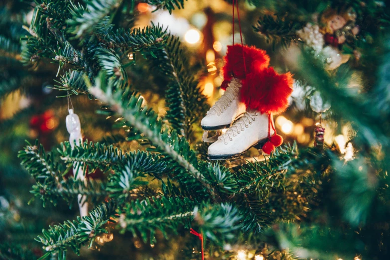 ornament in a christmas tree with some red ornaments