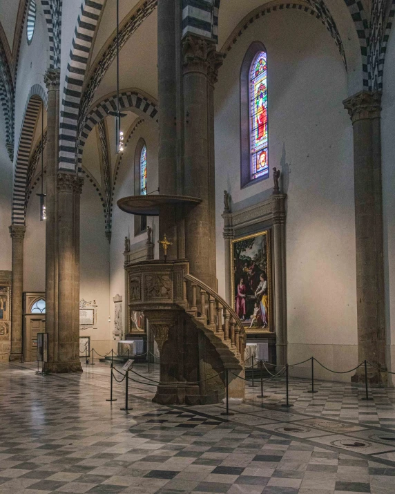 an ornate cathedral with decorative walls and flooring