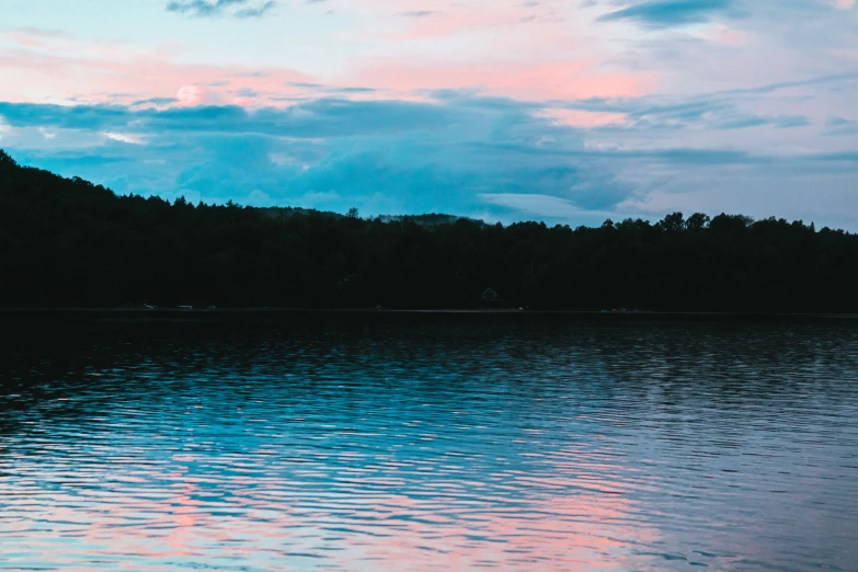 a body of water that has water and trees