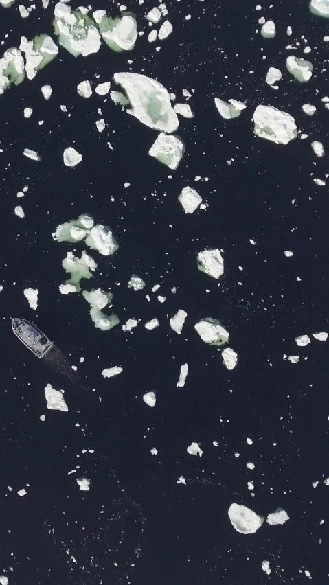 an aerial s of an ocean covered in ice