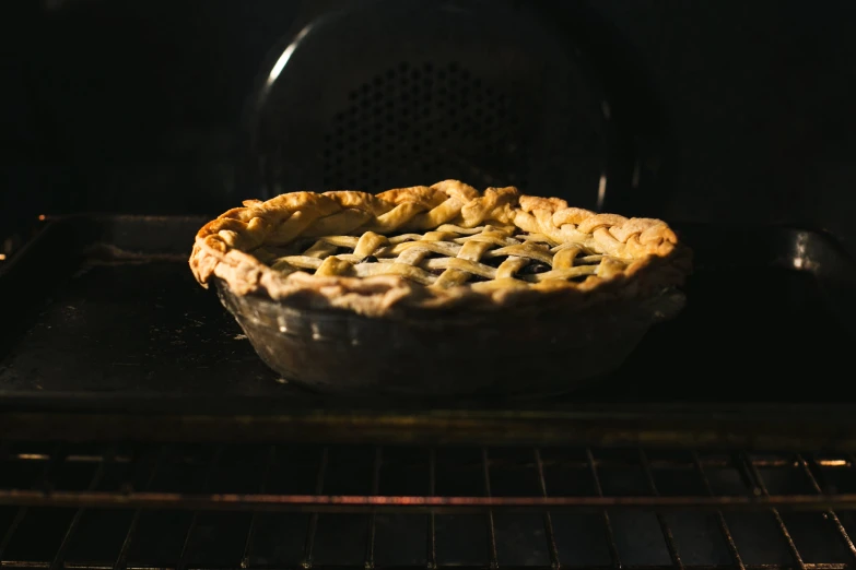 the pie is still on the oven in the oven