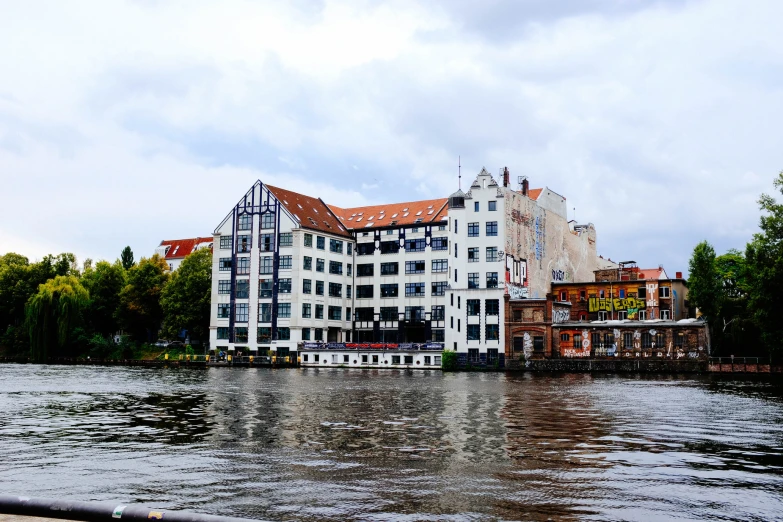 a building in a lake with lots of windows