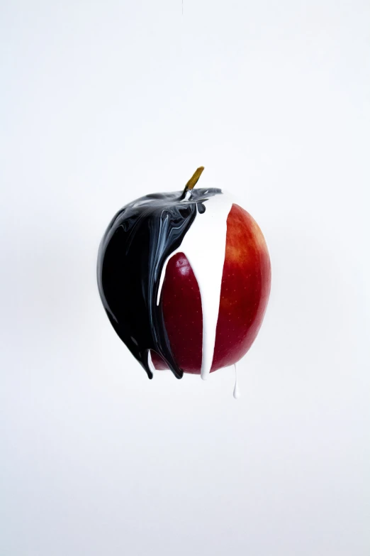 a white background has been altered to have an apple partially eaten