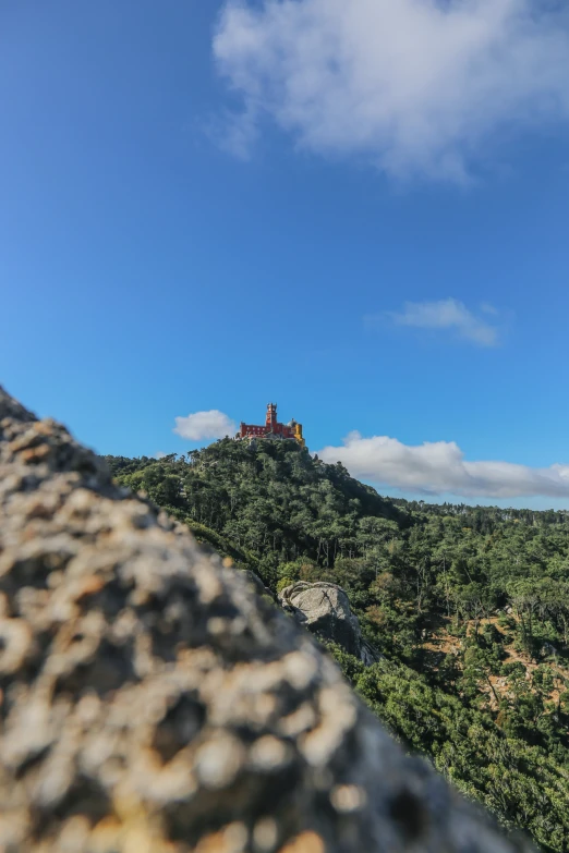 a scenic castle on top of a hill