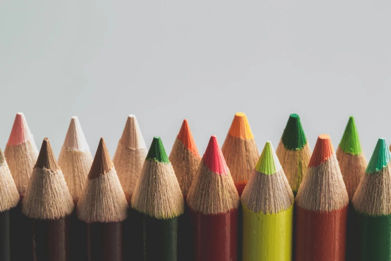 an image of several different colored pencils