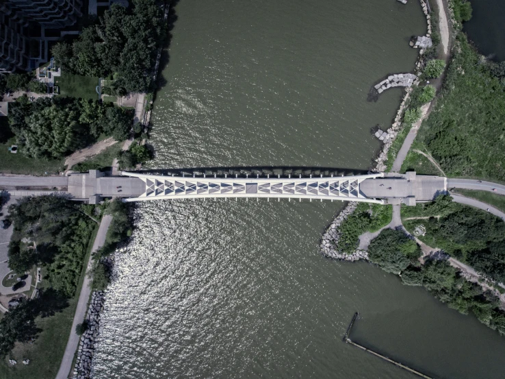 an aerial s of a long bridge crossing over water