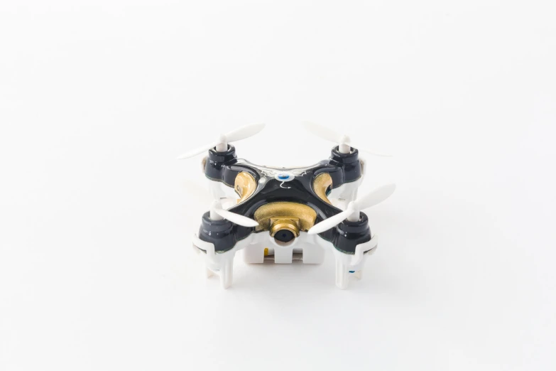 a white and black toy with two propellers