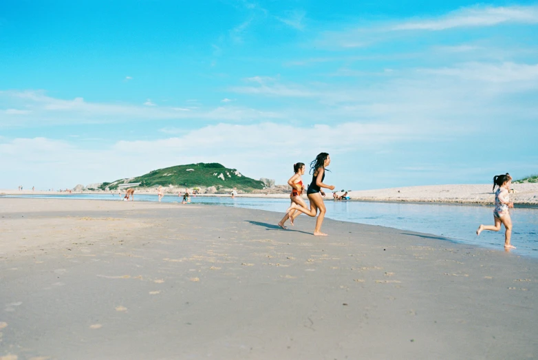 three people are in the ocean together