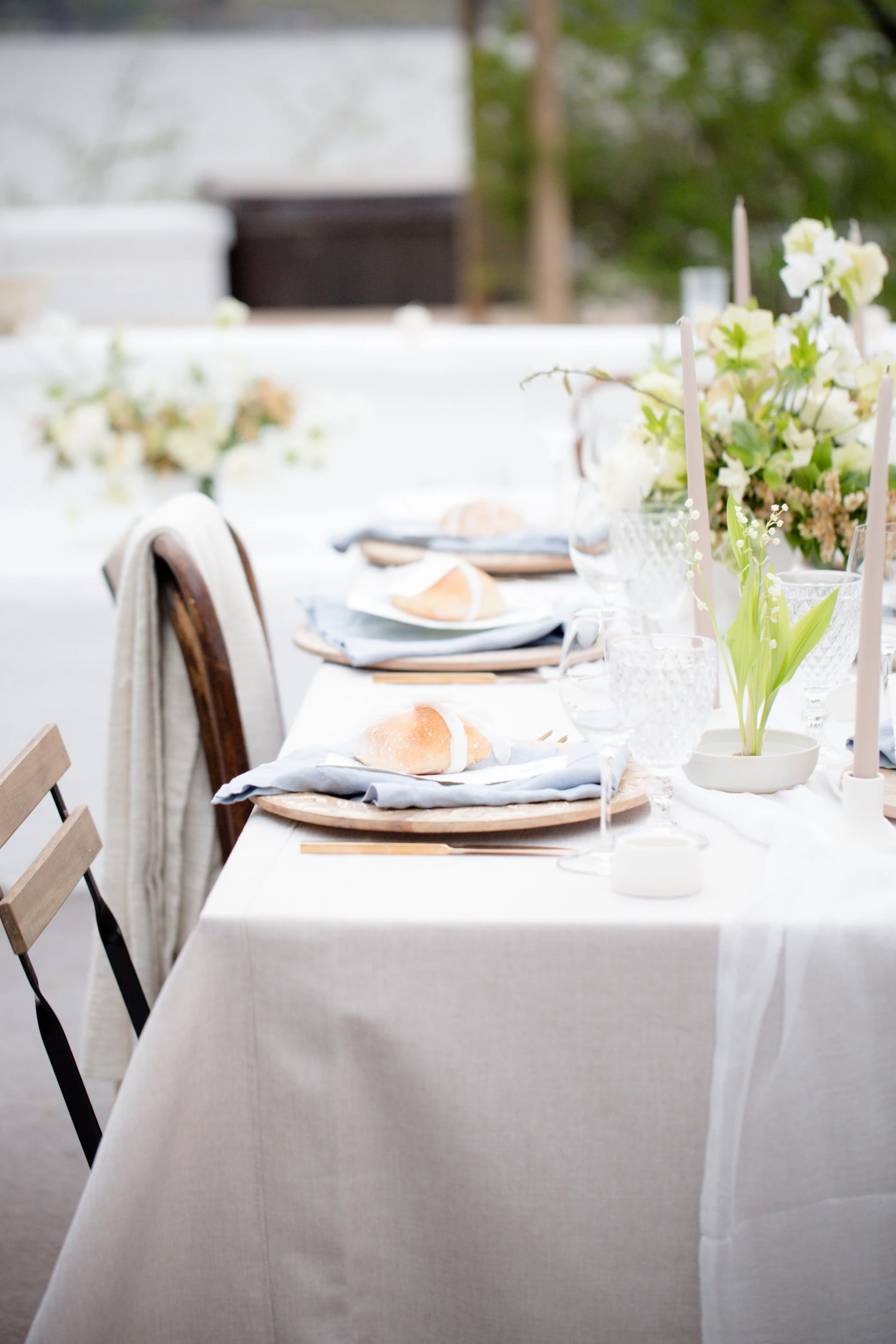 several plates on a table with napkins and silverware