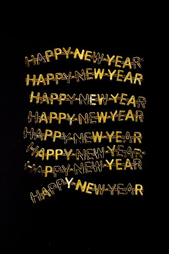 a happy new year card with gold foil lettering
