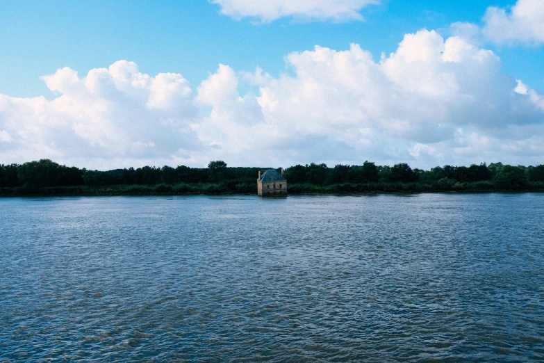 a house on the side of a river