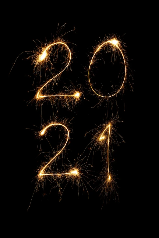 sparkling numbers on a black background, including one number