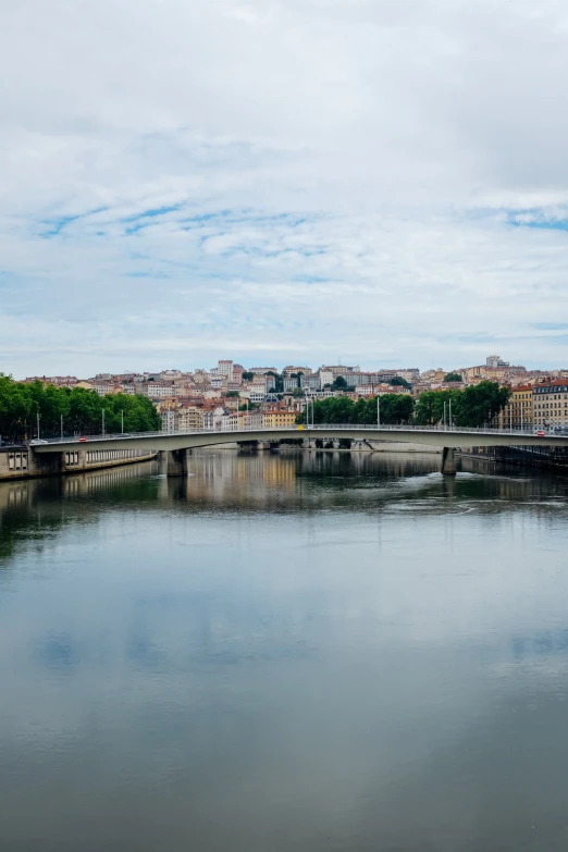 a beautiful view of a river and a bridge