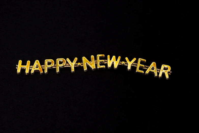 a happy new year message against a dark background