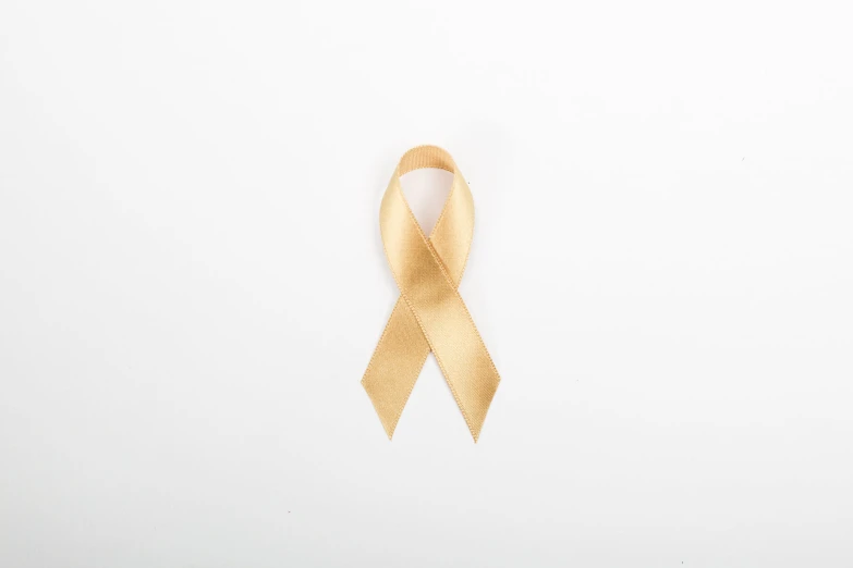 a close up of a wooden ribbon on white background