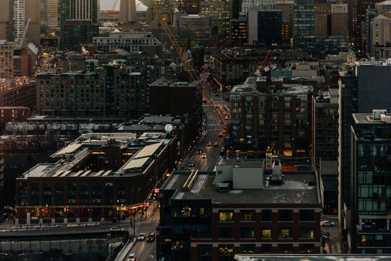 an aerial s of the city skyline at dusk