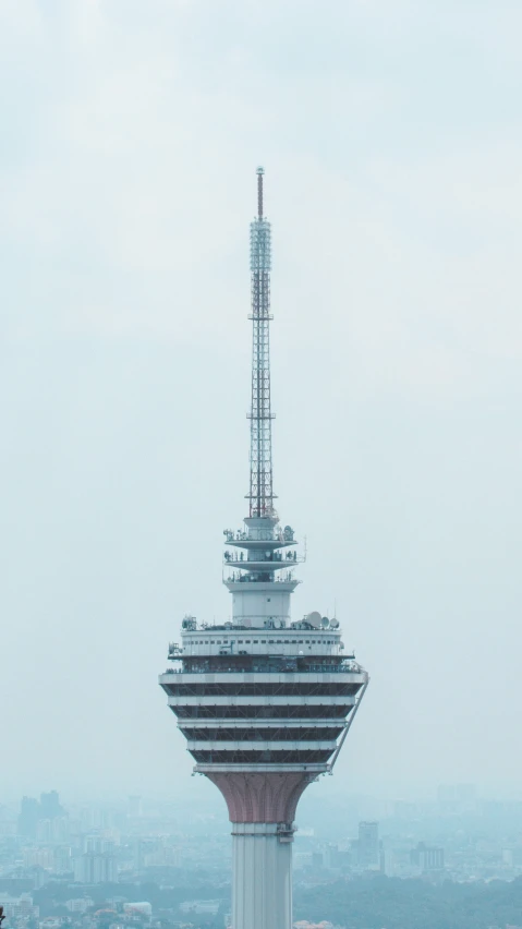 a view of a building from a top of a hill