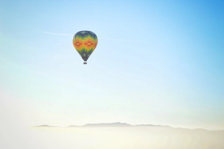 a  air balloon with the sky in the background