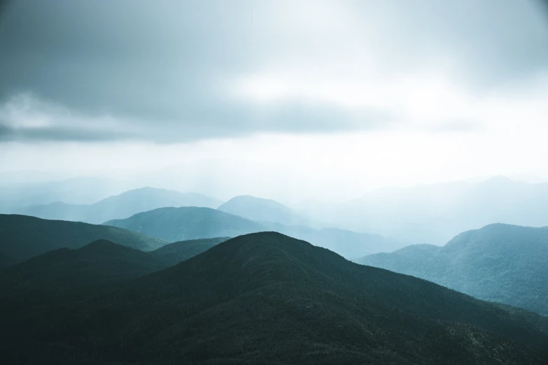 a view of the hills and valleys in the rain