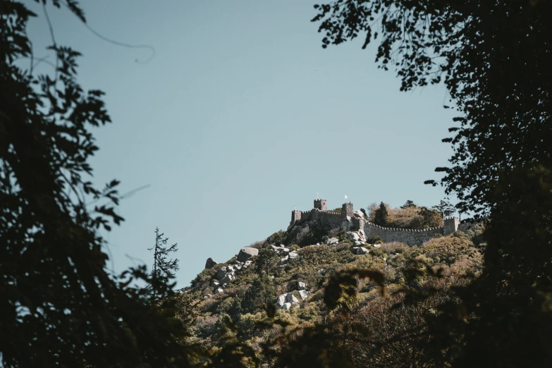 a castle built on top of a steep hill