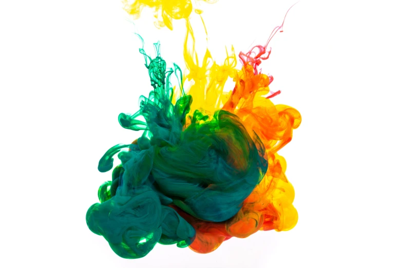 colorful ink in water is shown with colored clouds