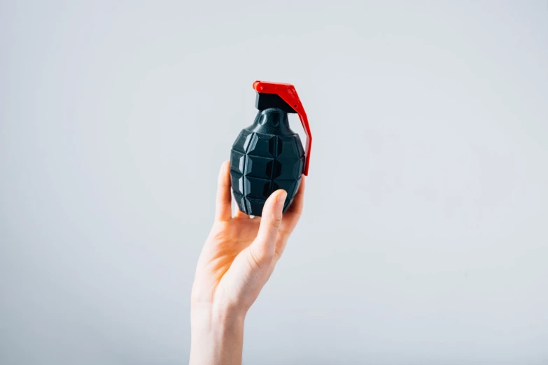 person holding a bottle in their hand while it has been opened