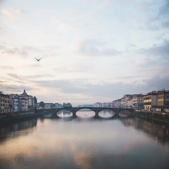 a body of water with some bridge over it