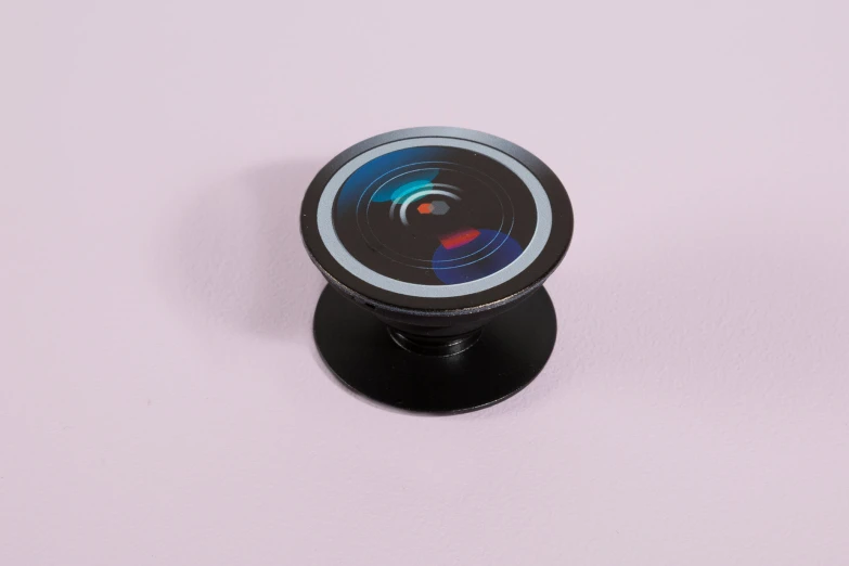 the black object has a small circular lens