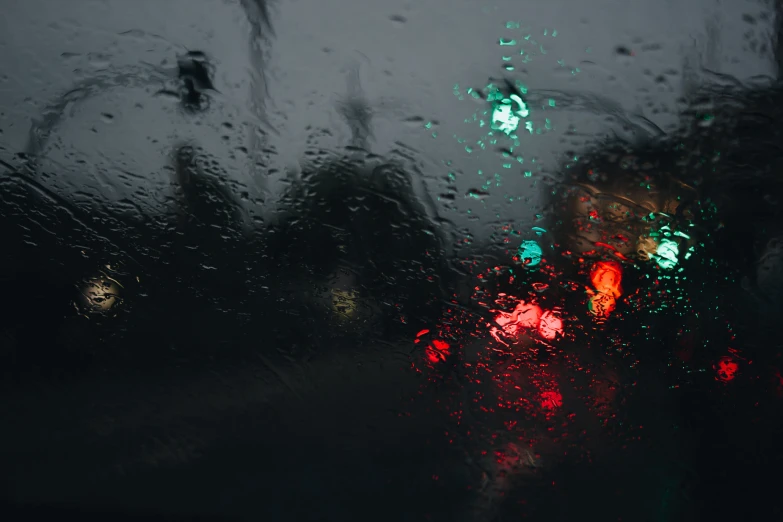 a view through a window during a rainy day