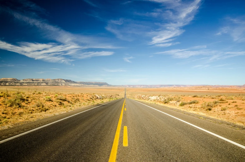 a view of a deserted highway during the day