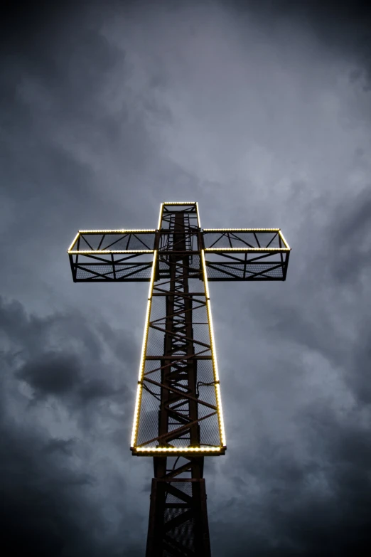 a tall metal structure with lights on it