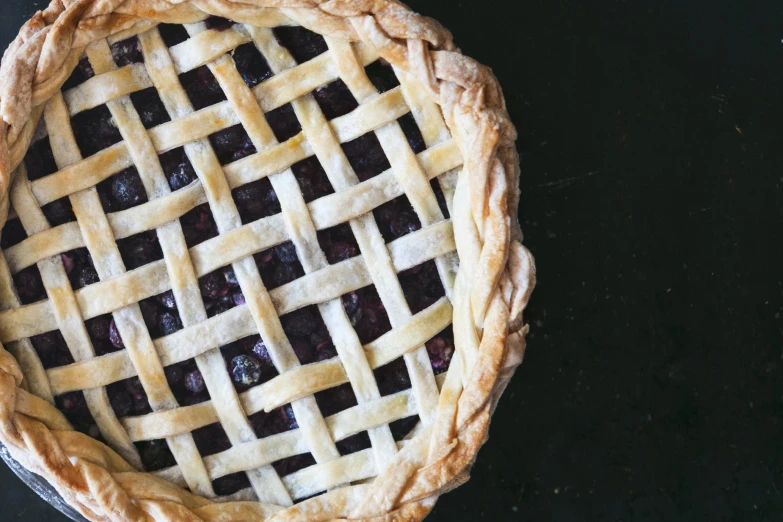 the pie is decorated with a lattice pattern