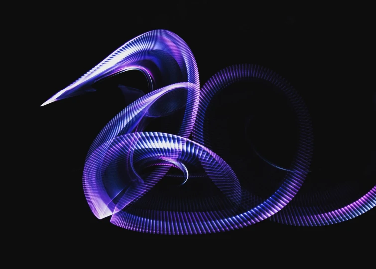 an abstract po, consisting of a spiral design, in the dark