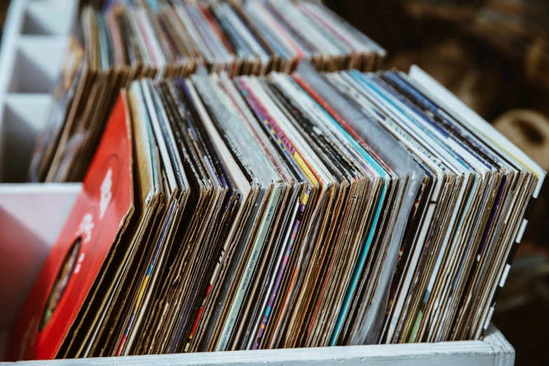 some very many stacks of cd and album records