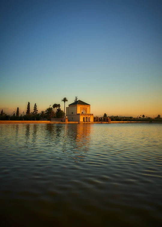 the large building is next to a body of water