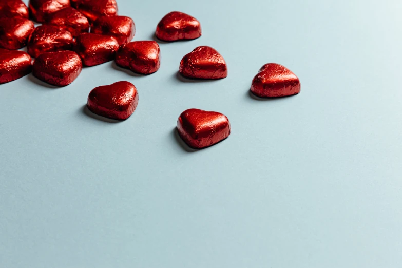 a group of hearts and other chocolate candys