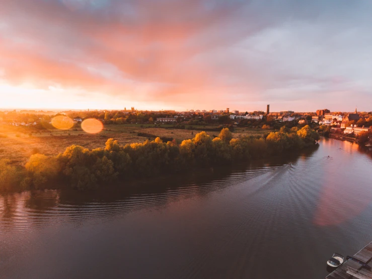 a river running along a scenic city skyline