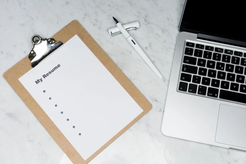 this is an image of a notebook and a laptop