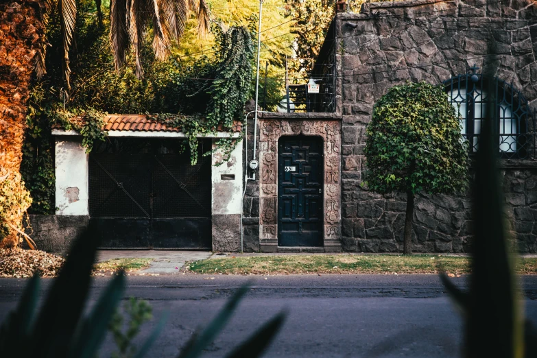 a car parked on the side of a road by some buildings