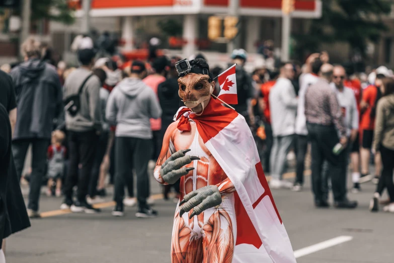 a street with many people wearing halloween costumes