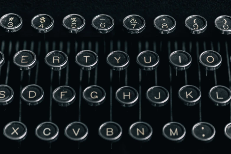an old typewriter with numbers and other symbols