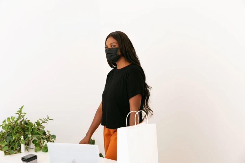 a woman with a face mask on