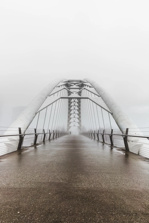 an outdoor walkway in a foggy weather