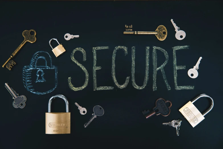 several locks, keys, and padlocks written in chalk on a blackboard