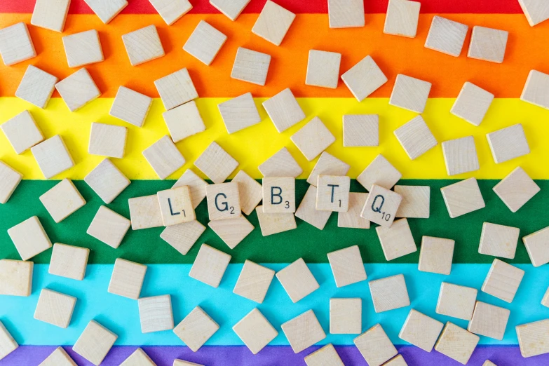 the word lgbt spelled by small letters in different colors