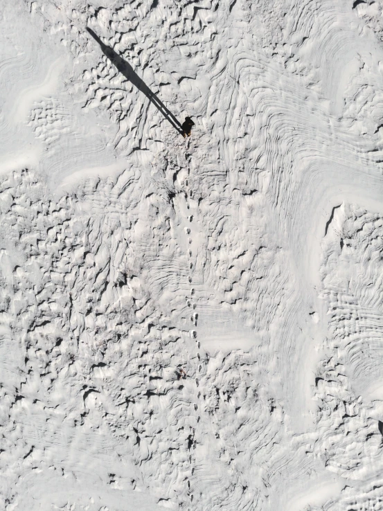 a snow boarder flies through the air during a big jump