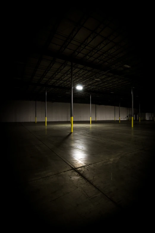 a parking lot at night with no one inside of it